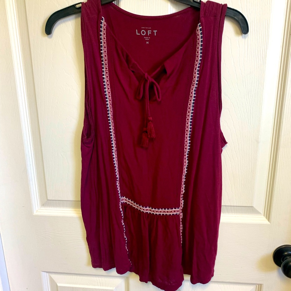 Loft Ladies Medium Rayon sleeveless blouse. Keyhole neck that ties in the front.